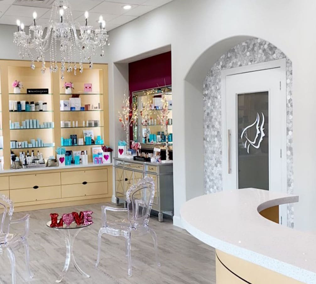 a room filled with furniture and a sink