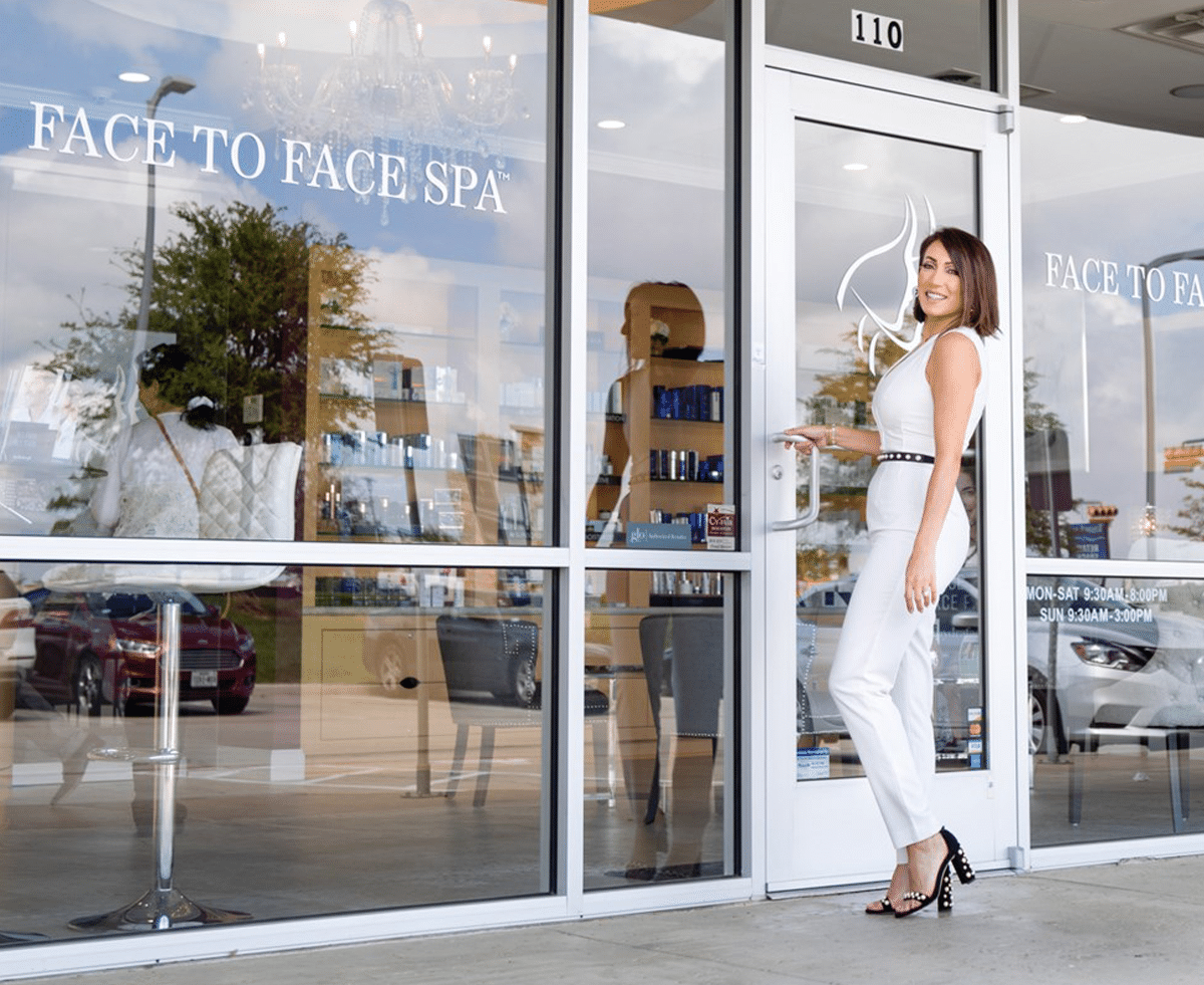 a person standing in front of a store