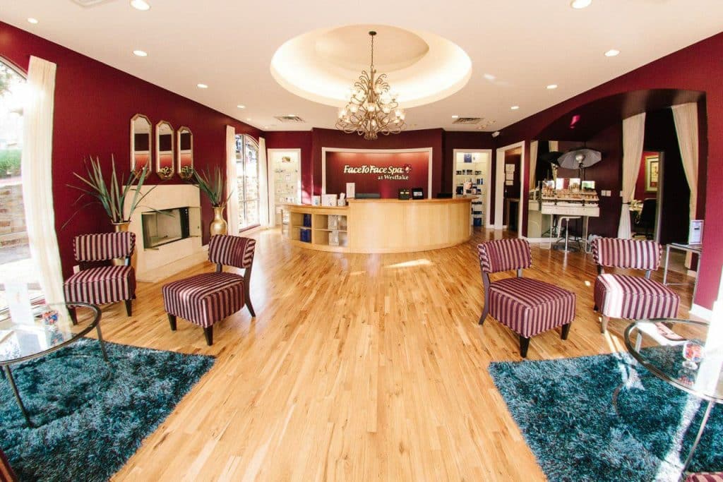 a living room filled with furniture and a fire place